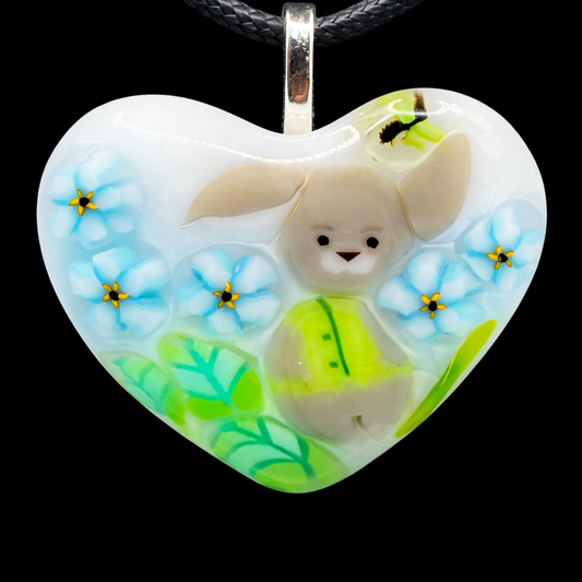 108- White glass Murrini pendant with blue flowers and bunny