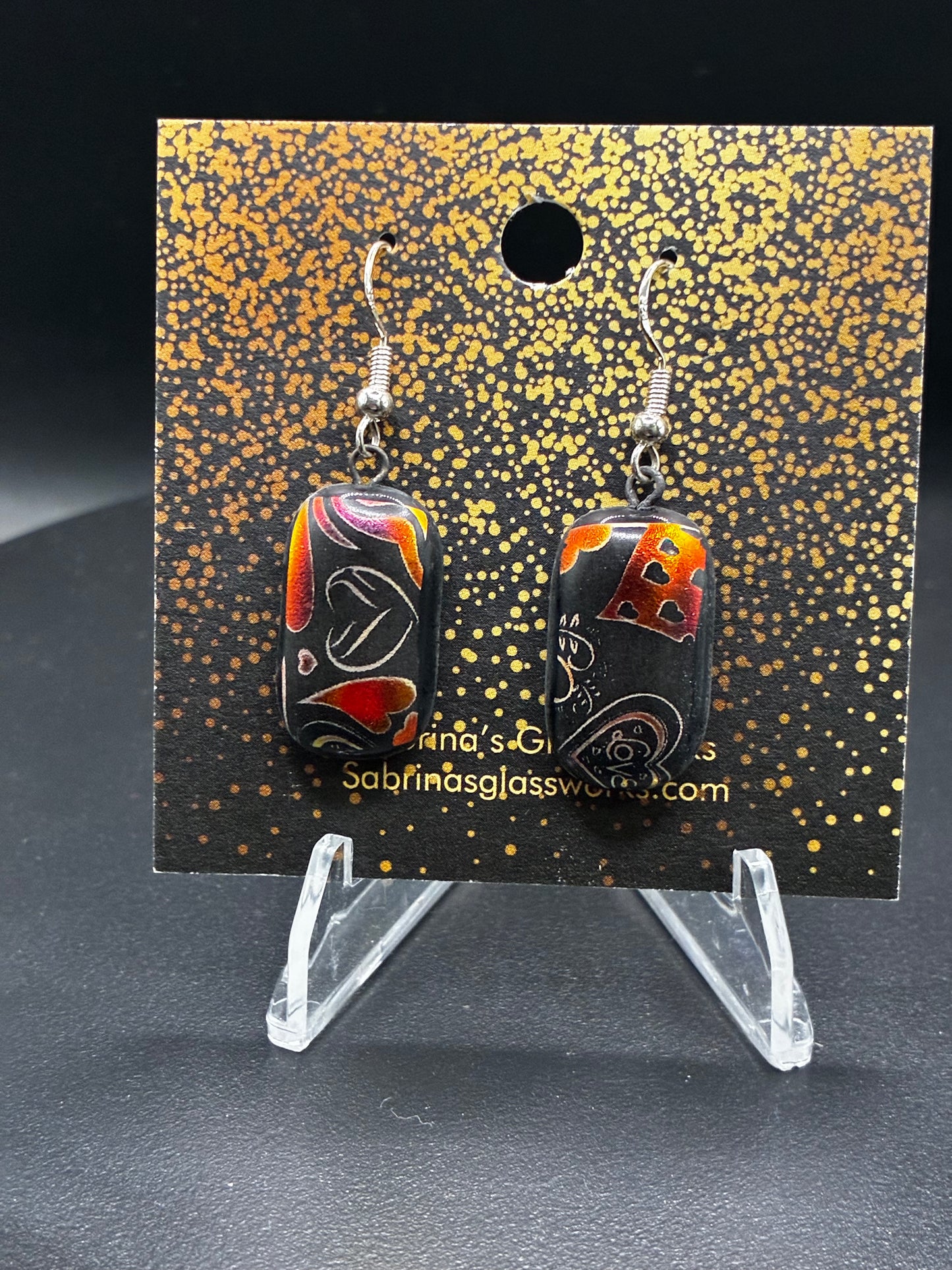 485-Red and black heart Dichroic glass earrings